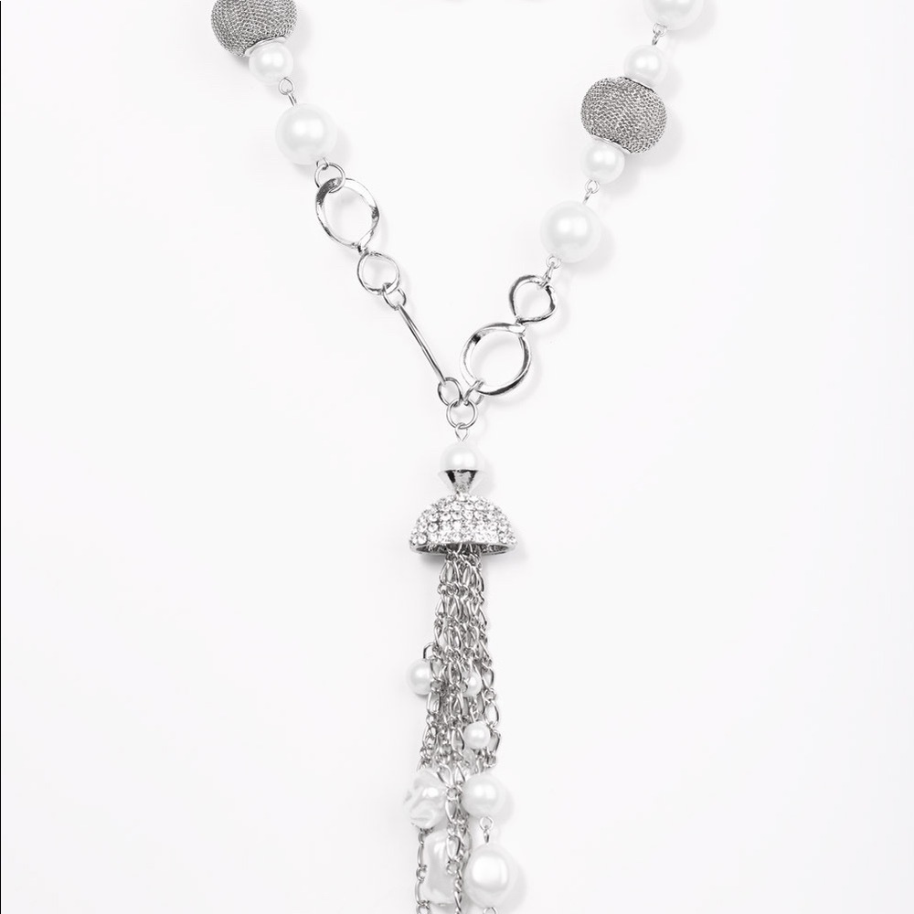 Rhinestone and pearl necklace and earring set.